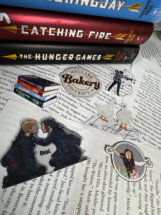 Hunger Games Sticker Pack – Katniss, Peeta, Lucy Gray, Book Stack, Quote – Waterproof Vinyl Stickers